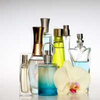 Multicolored perfumes in bottles of different shapes